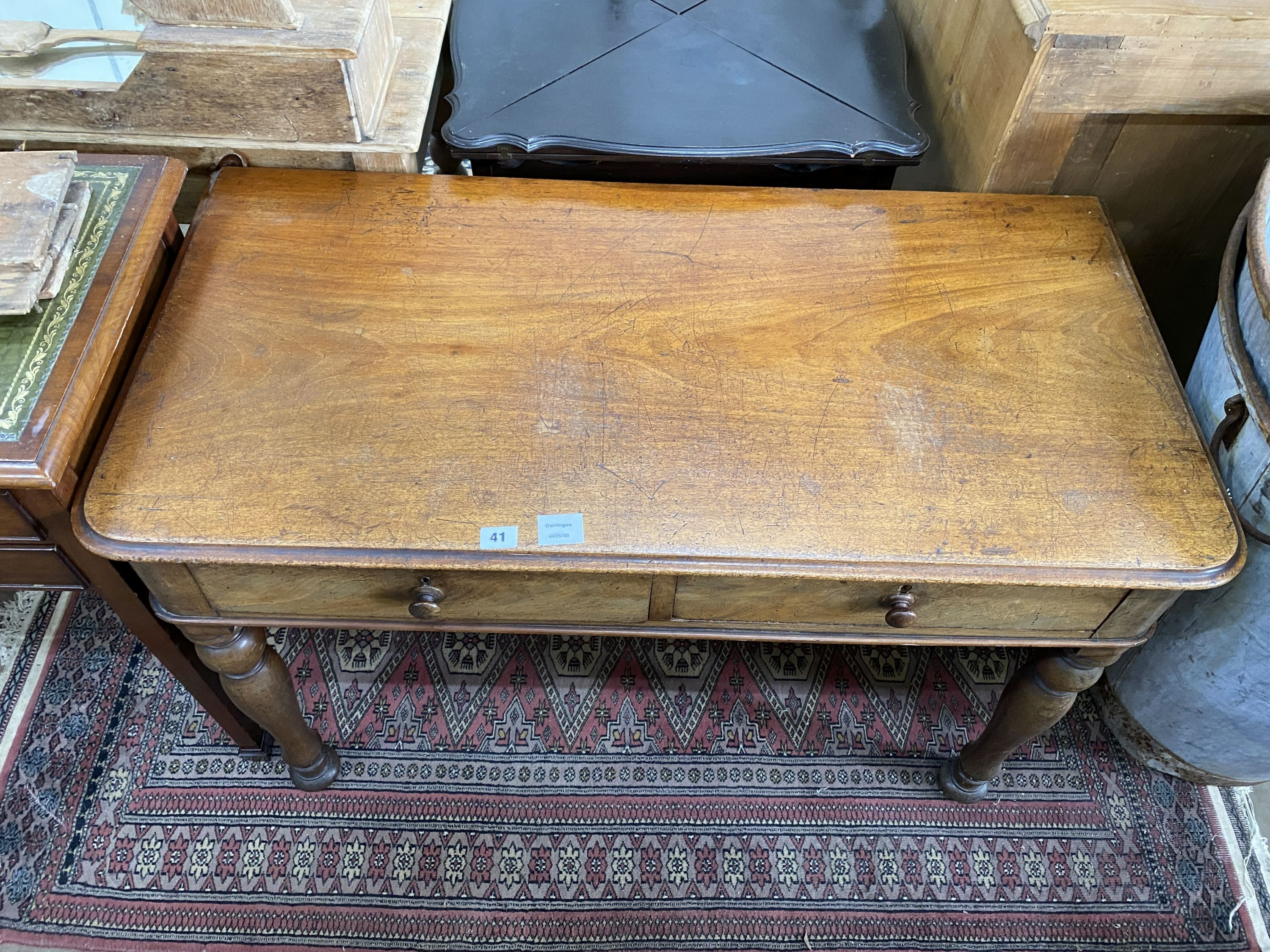 A Victorian mahogany two drawer side table, width 106cm, depth 53cm, height 69cm